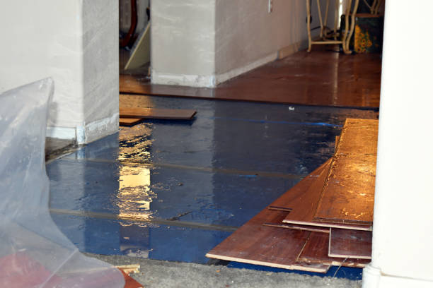 Professional Water Damage Restoration technician working in Lancaster, MA